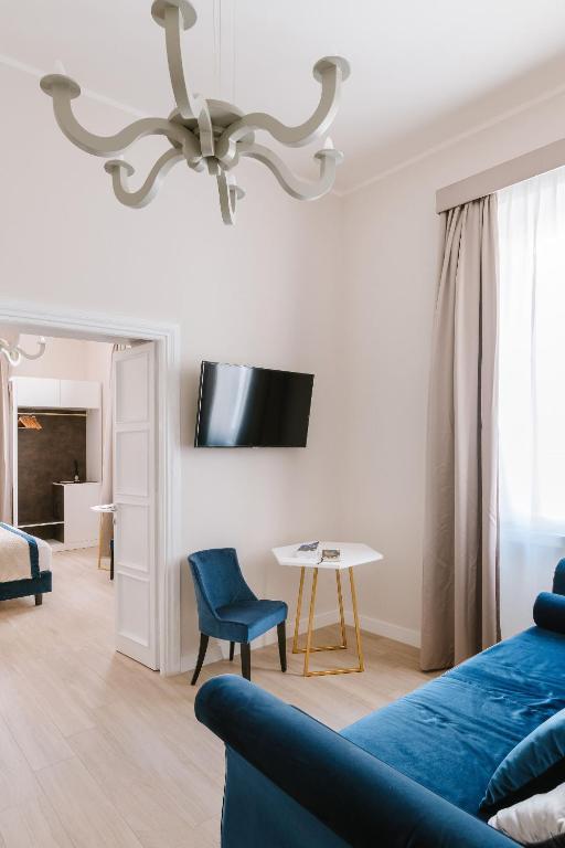 Uma TV ou centro de entretenimento em Rhea Silvia Luxury Navona