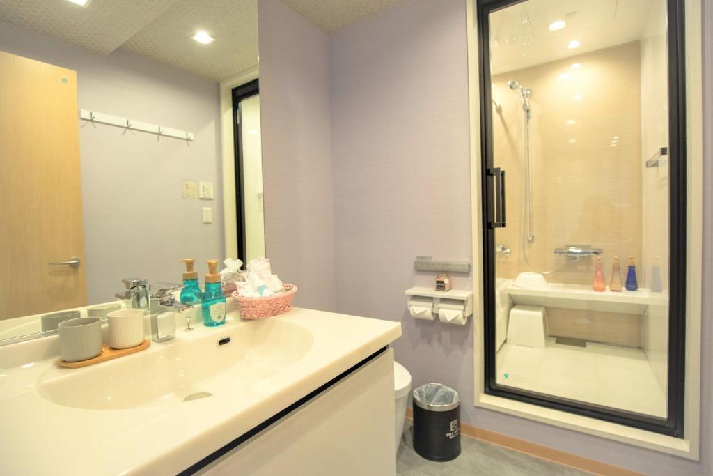 Koupelna v ubytování SOLA HOTEL