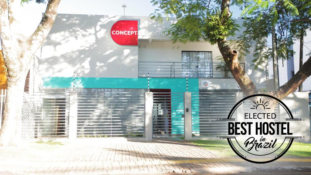 a building with a best inside sign in front of it at Concept Design Hostel & Suites in Foz do Iguaçu