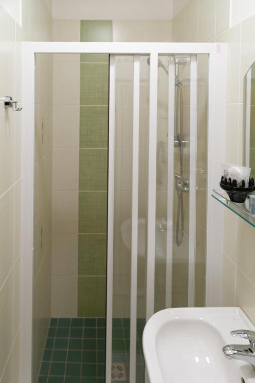 Koupelna v ubytování Hotel KAMU GARNI