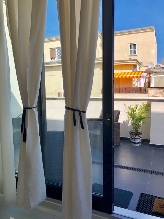 Balkón nebo terasa v ubytování City Center Penthouse