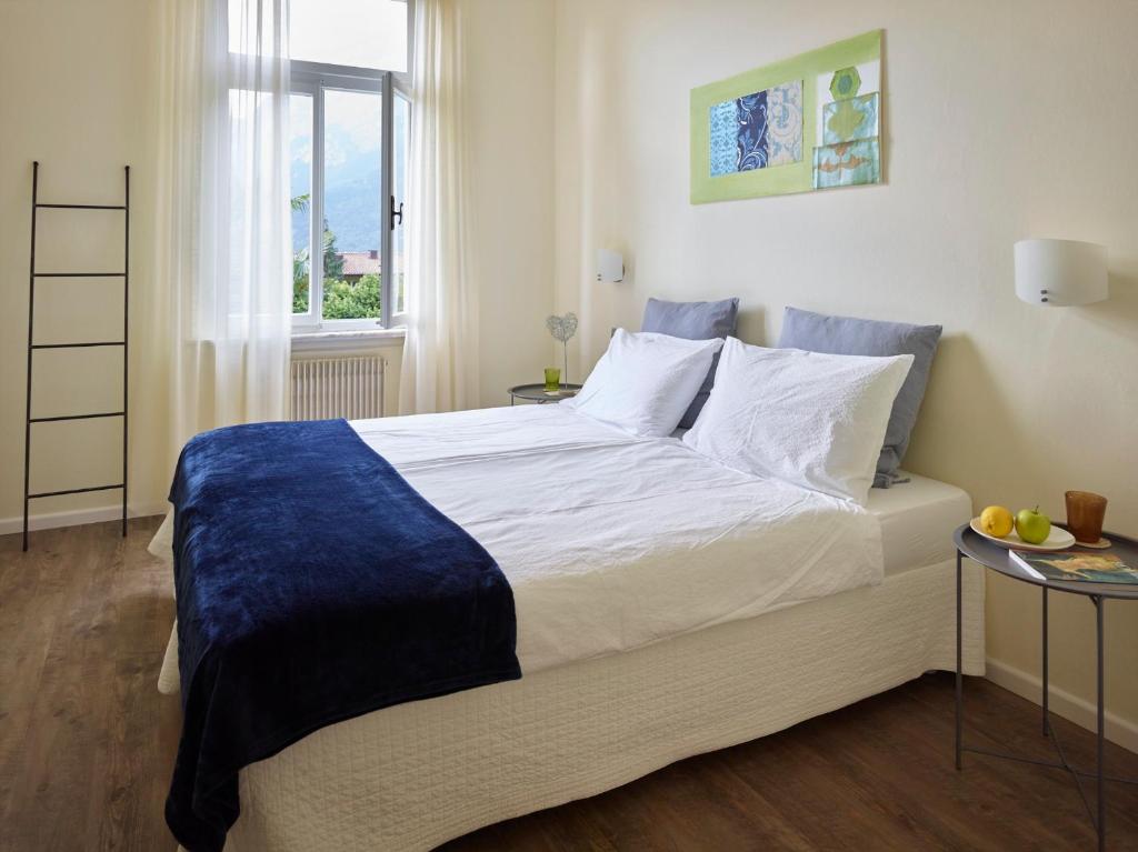 Postel nebo postele na pokoji v ubytování Albergo Garnì Villa Moretti