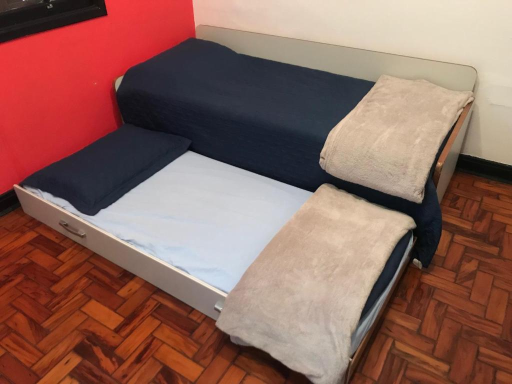 Postel nebo postele na pokoji v ubytování NeighborHUB hostel e coliving