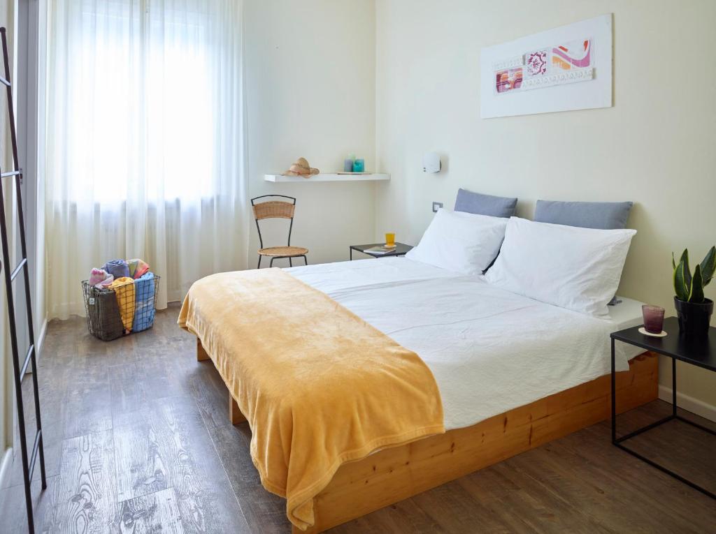 Postel nebo postele na pokoji v ubytování Albergo Garnì Villa Moretti