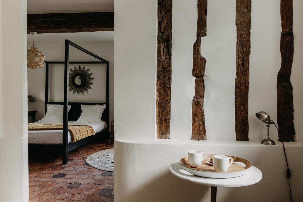 Postel nebo postele na pokoji v ubytování La Dime de Giverny - Chambres d'hôtes