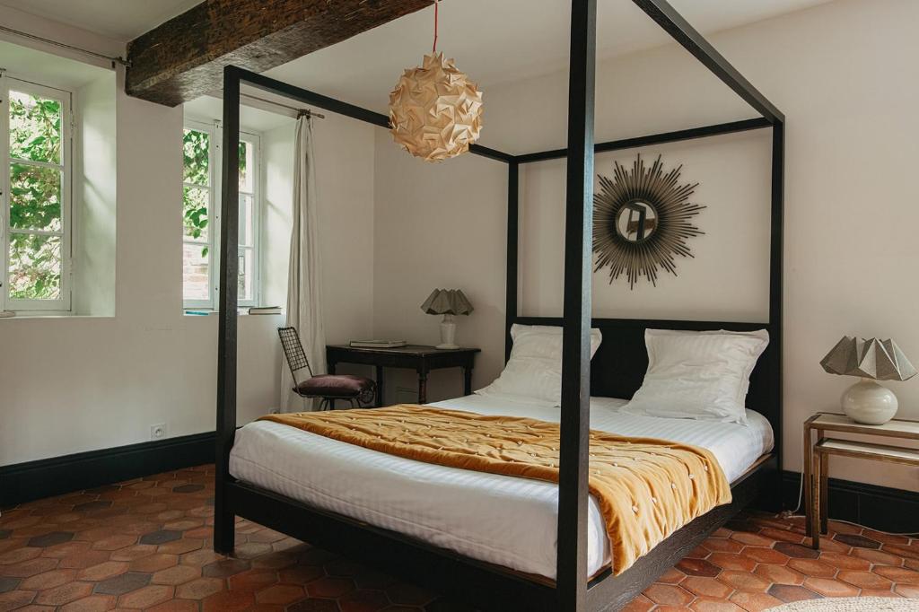 Postel nebo postele na pokoji v ubytování La Dime de Giverny - Chambres d'hôtes