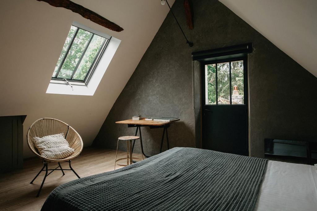 Postel nebo postele na pokoji v ubytování La Dime de Giverny - Chambres d'hôtes