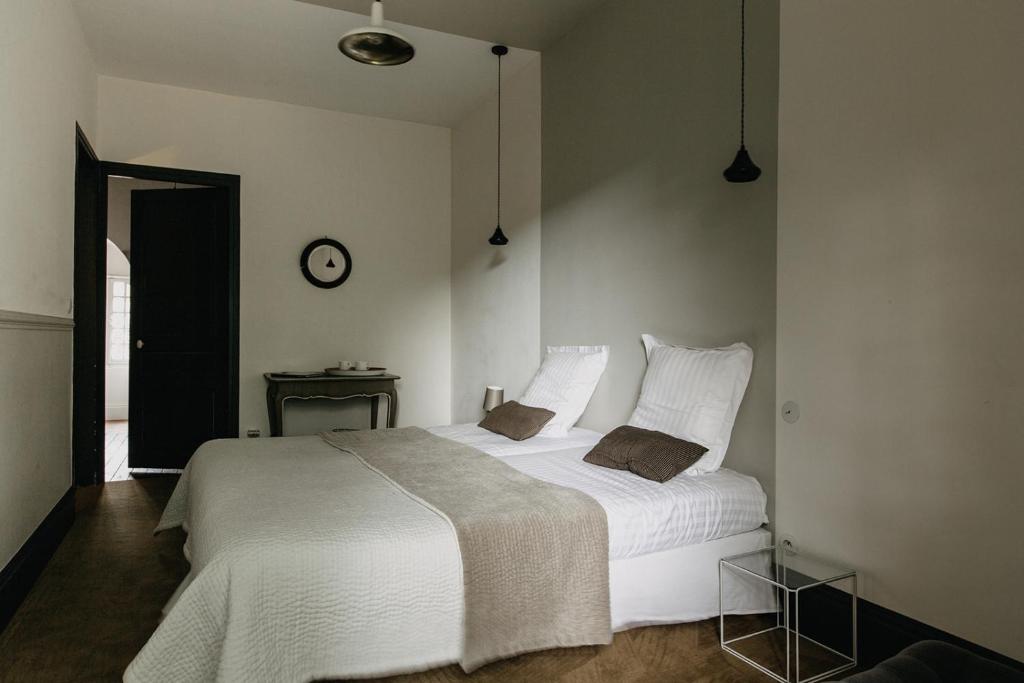 Postel nebo postele na pokoji v ubytování La Dime de Giverny - Chambres d'hôtes