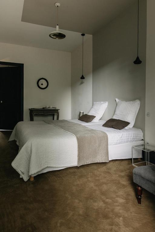Postel nebo postele na pokoji v ubytování La Dime de Giverny - Chambres d'hôtes
