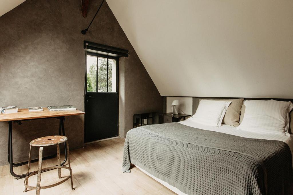 Postel nebo postele na pokoji v ubytování La Dime de Giverny - Chambres d'hôtes