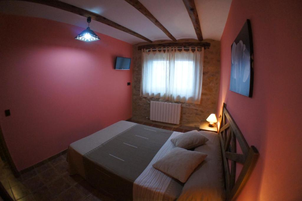 Postel nebo postele na pokoji v ubytování Balcón De Ares