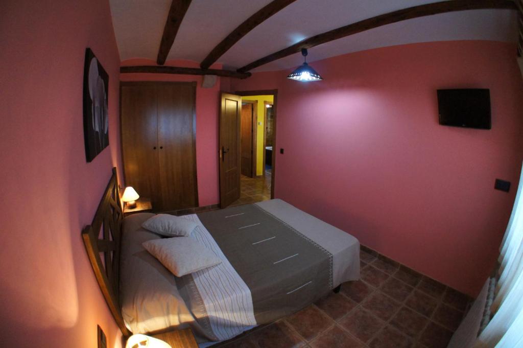 Postel nebo postele na pokoji v ubytování Balcón De Ares
