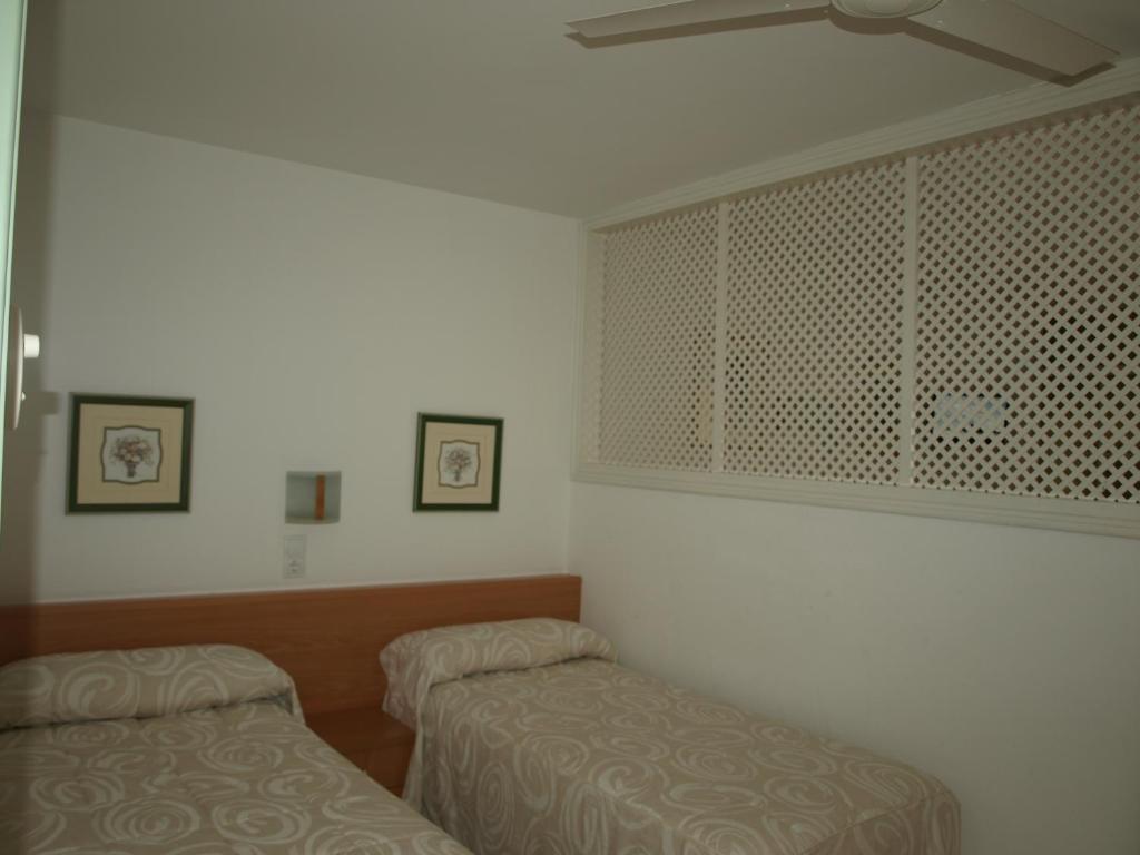 Postel nebo postele na pokoji v ubytování Apartaments Geminis