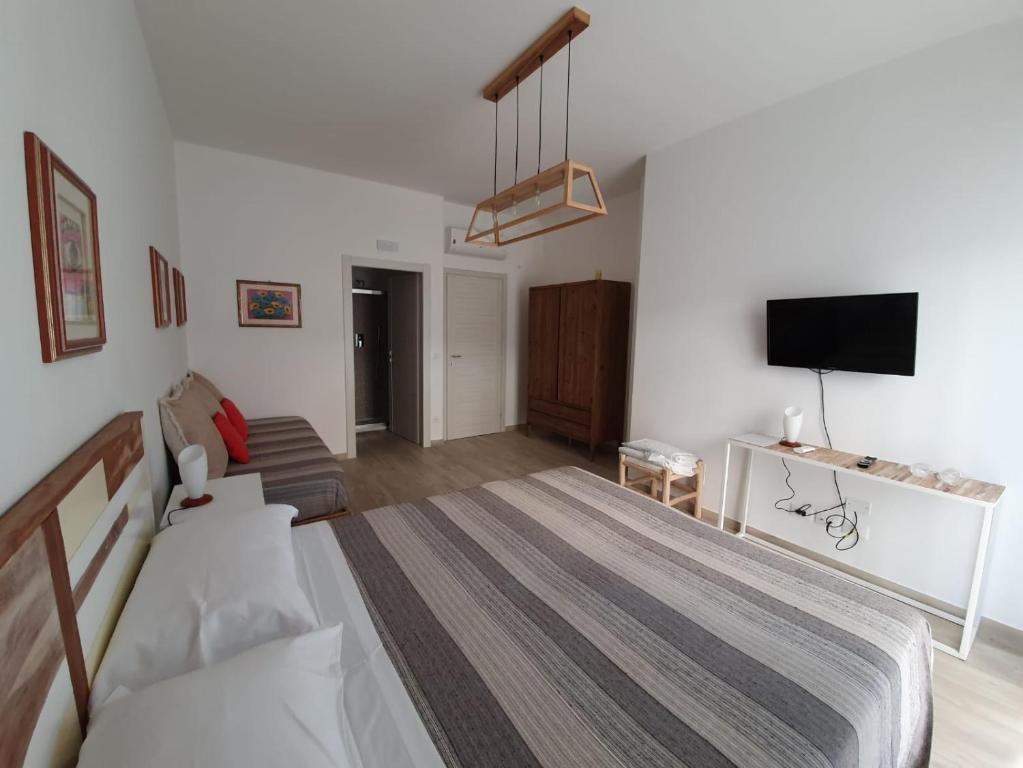 Postel nebo postele na pokoji v ubytování B&B Locanda Criloro