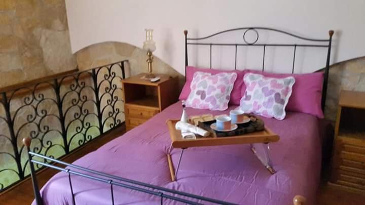 מיטה או מיטות בחדר ב-Petit Chalet