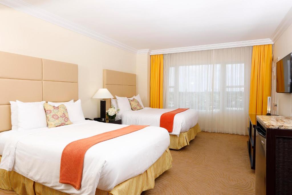Postel nebo postele na pokoji v ubytování Sea View Hotel