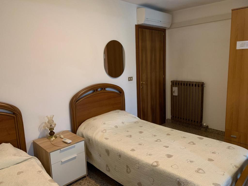 Letto o letti in una camera di Camere Solidea