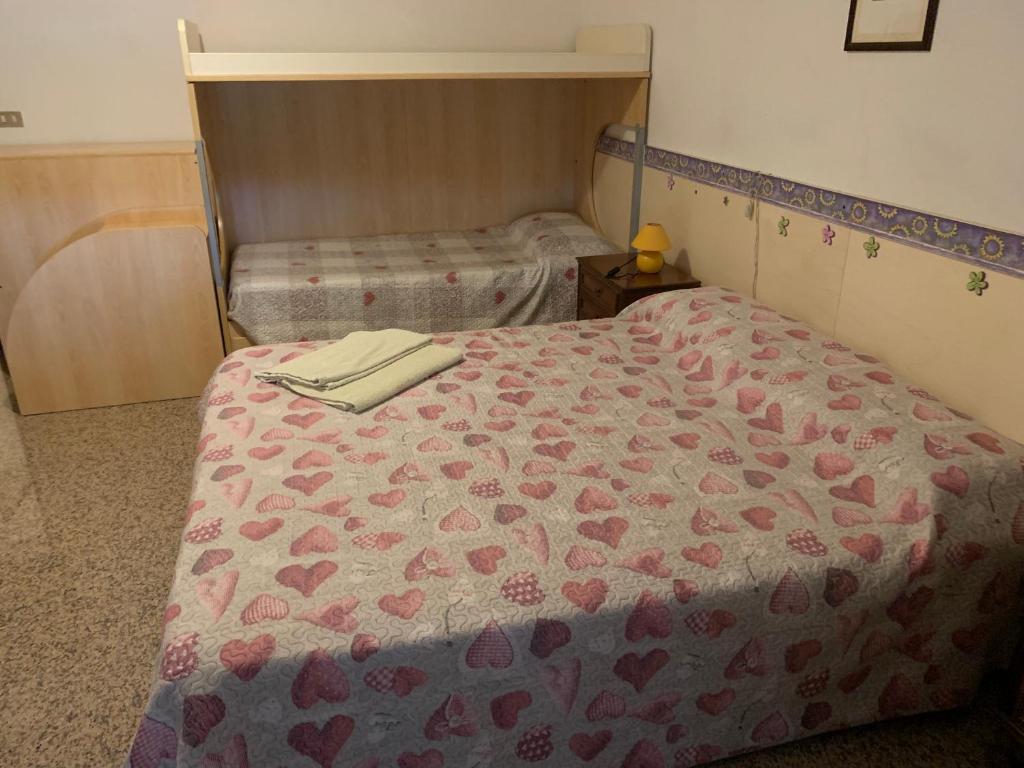 Letto o letti in una camera di Camere Solidea