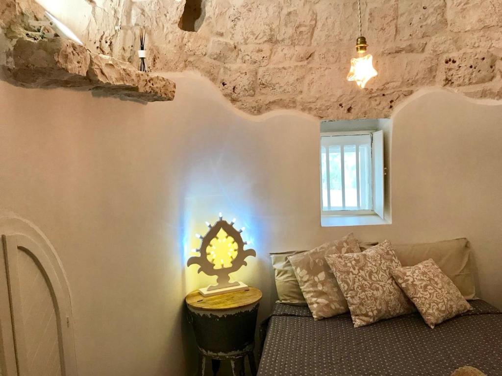 A seating area at Trulli Storie di Puglia - Private Pool