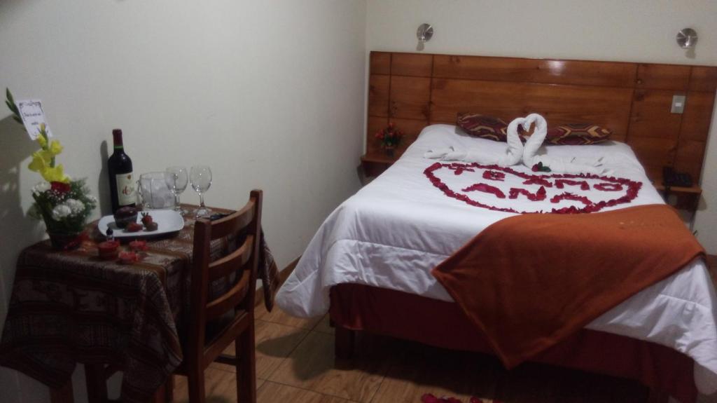 Postel nebo postele na pokoji v ubytování Munayki Hotel