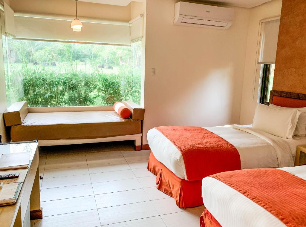 Postel nebo postele na pokoji v ubytování Misibis Bay