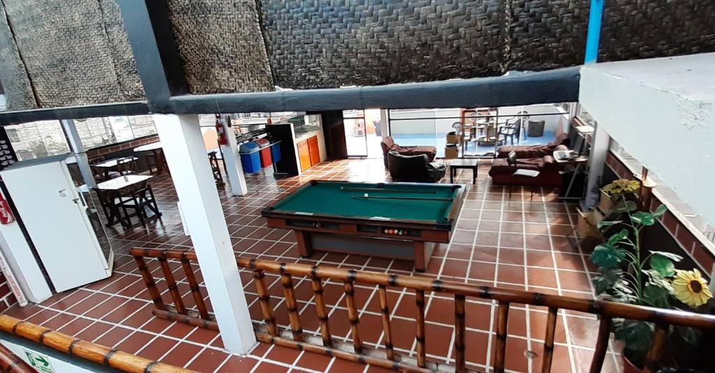 Biliár nebo kulečník v ubytování Hostal Sendero de Volcanes