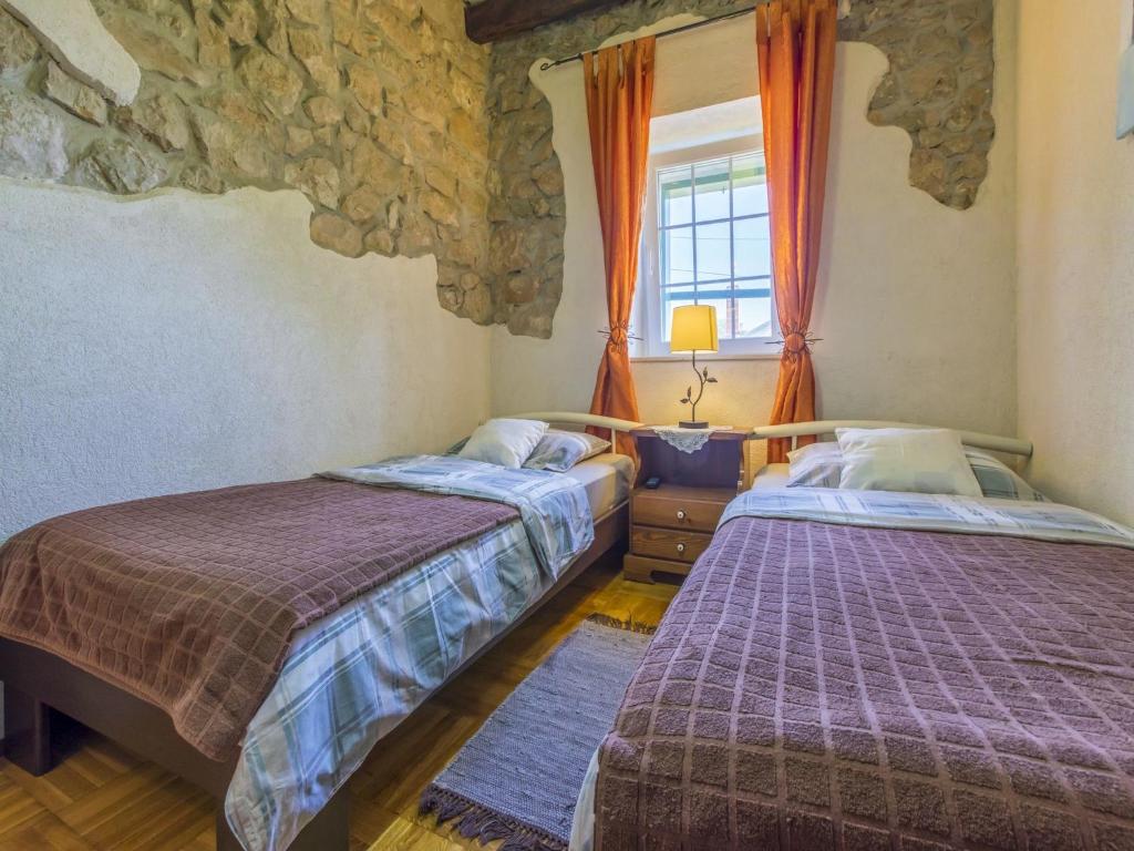Postel nebo postele na pokoji v ubytování House Lana