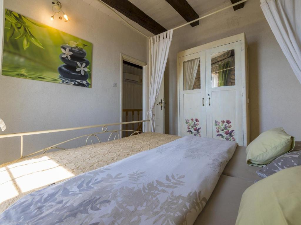 Postel nebo postele na pokoji v ubytování House Lana