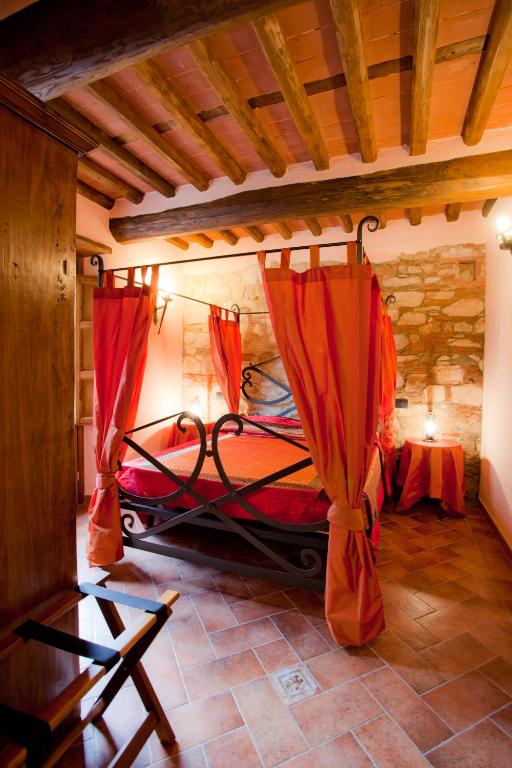 Postel nebo postele na pokoji v ubytování Castello dei Templari