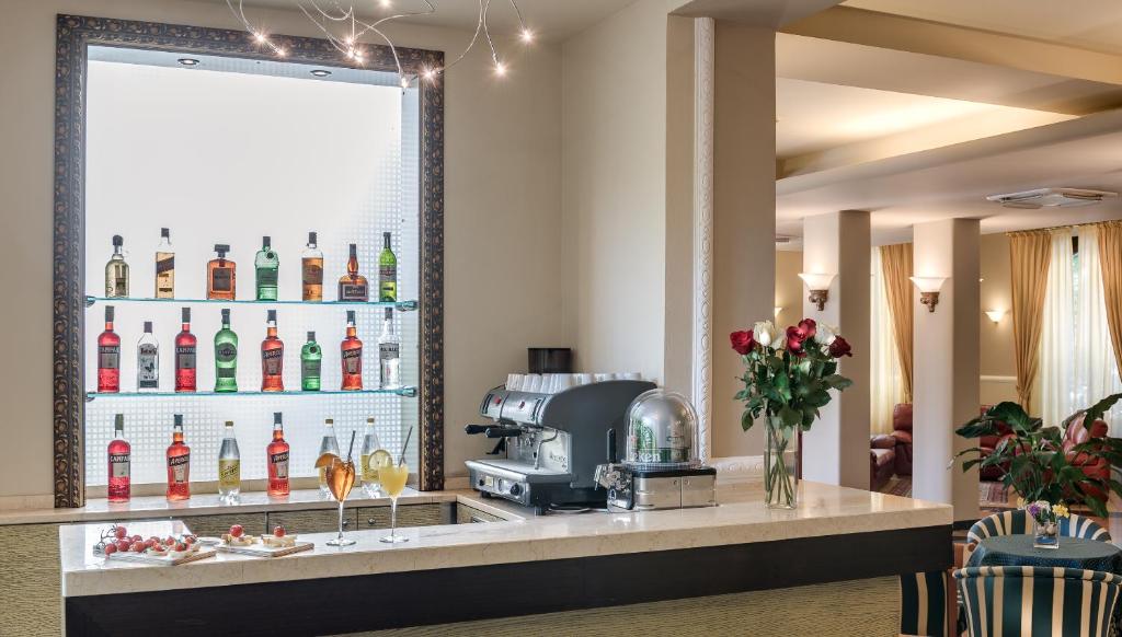 Nápoje v ubytování Hotel Da Vinci