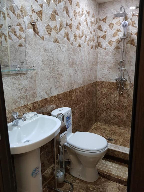 Koupelna v ubytování Ahana Hotel