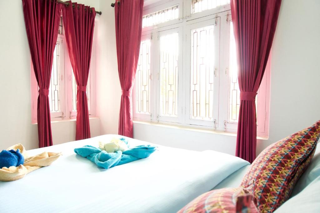 Ένα ή περισσότερα κρεβάτια σε δωμάτιο στο Hope Guest House