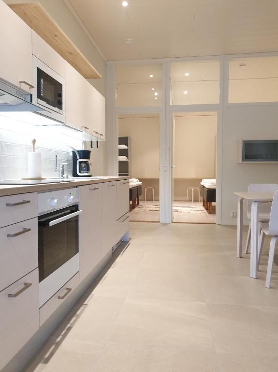 Кухня или мини-кухня в Rukariutta Apartments
