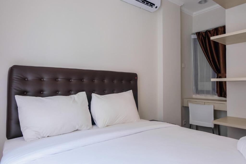 Postel nebo postele na pokoji v ubytování Highest Value 1BR Apartment at Asatti Vanya Park By Travelio