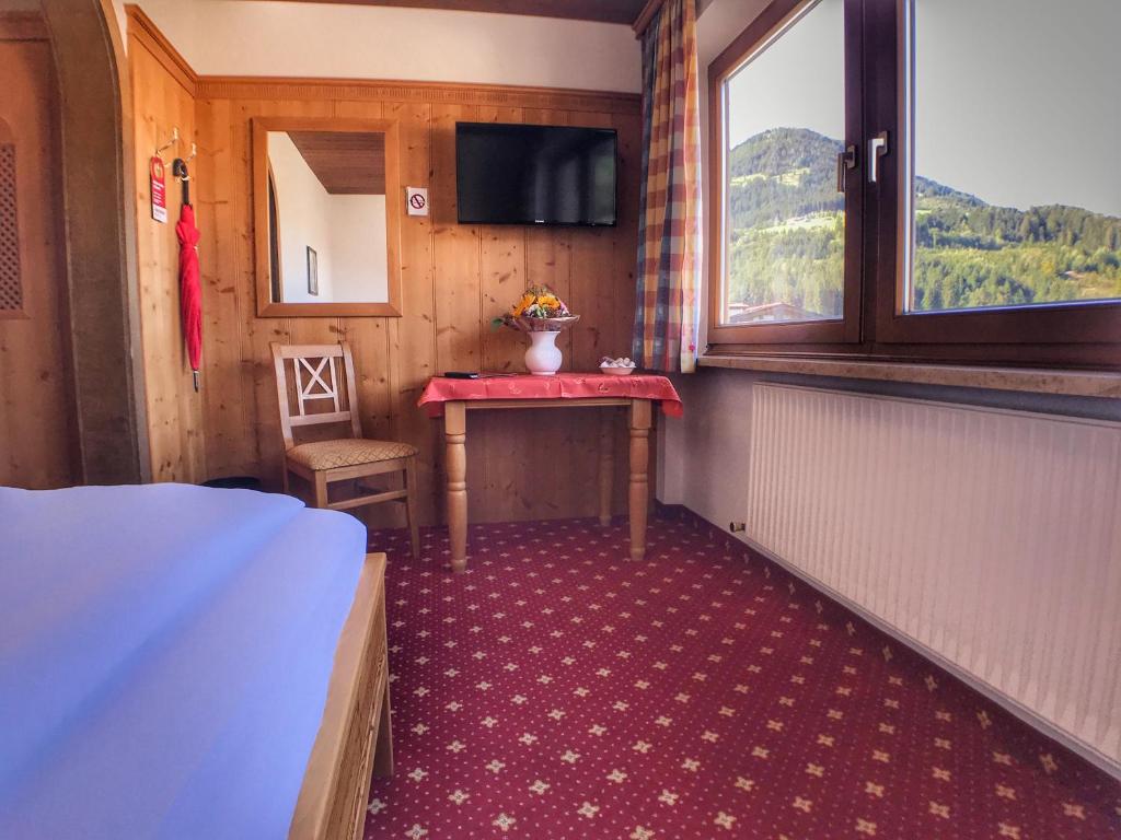 TV a/nebo společenská místnost v ubytování Hotel Bechlwirt