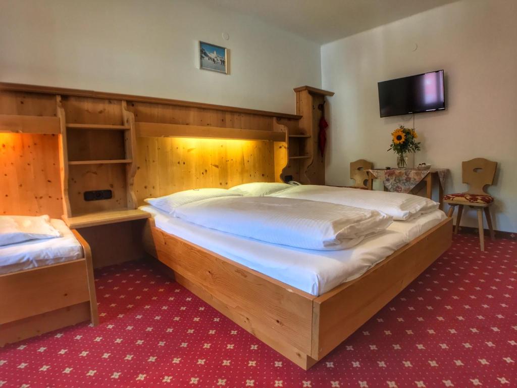 Postel nebo postele na pokoji v ubytování Hotel Bechlwirt