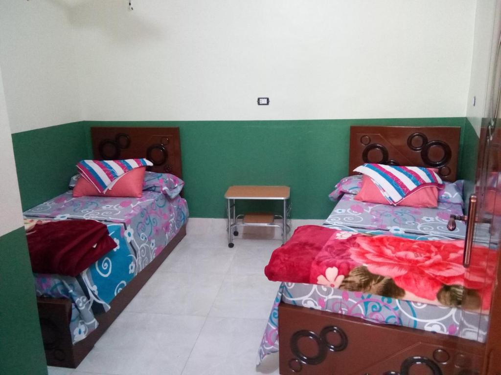 Postel nebo postele na pokoji v ubytování El-amin Guest House