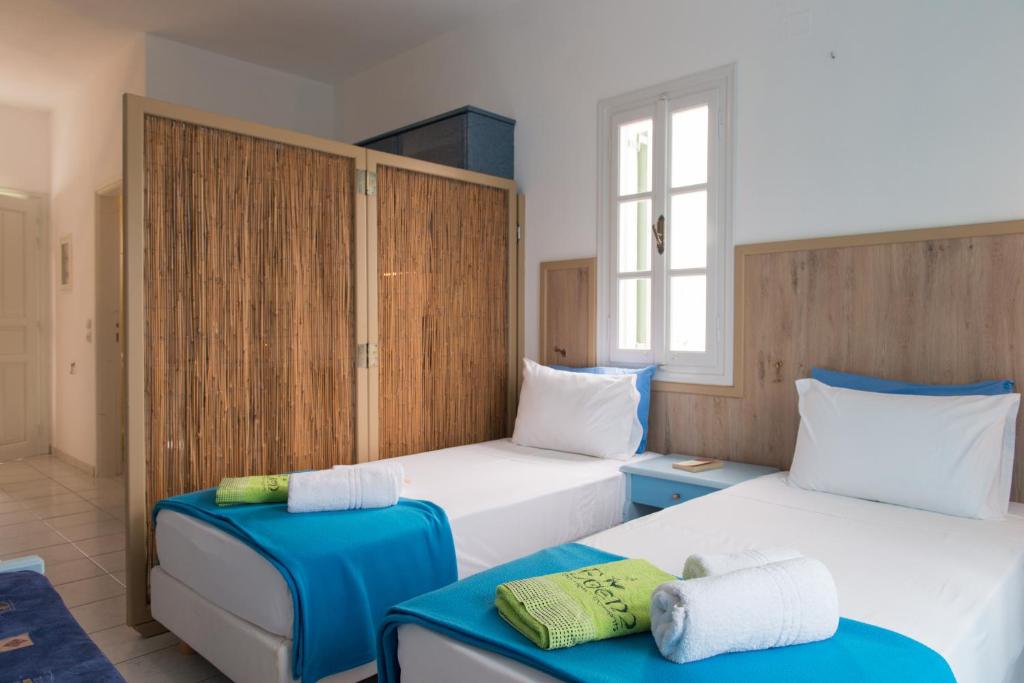 Postel nebo postele na pokoji v ubytování Edem Hotel