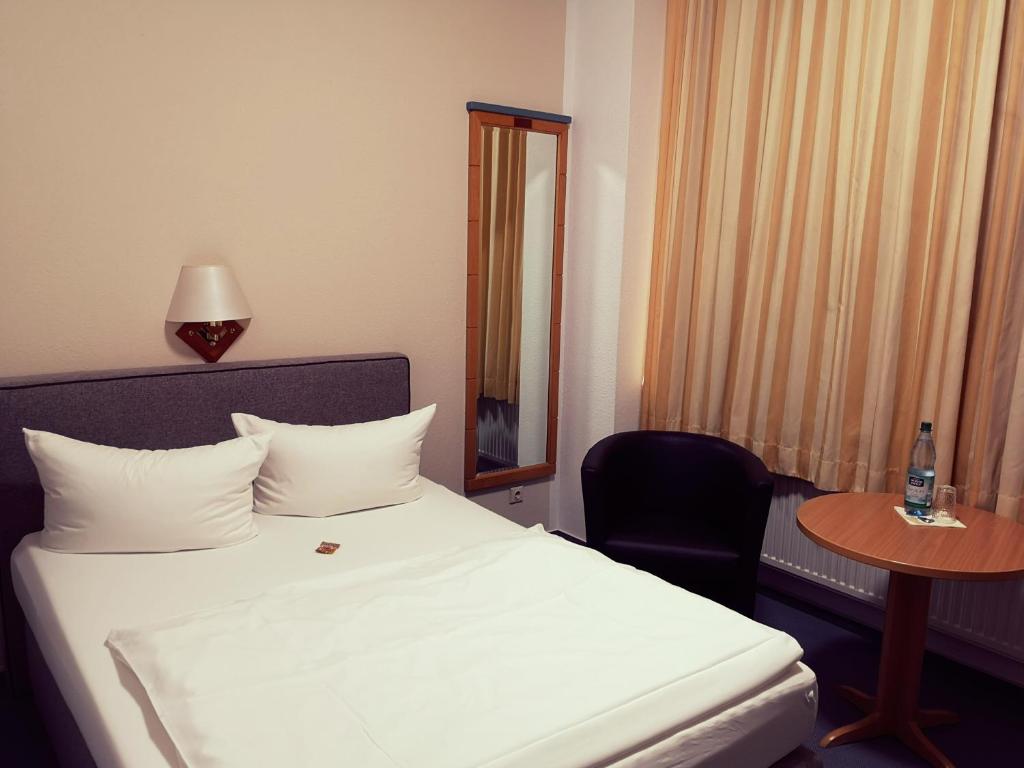 Voodi või voodid majutusasutuse Hotel Zur Alten Druckerei toas