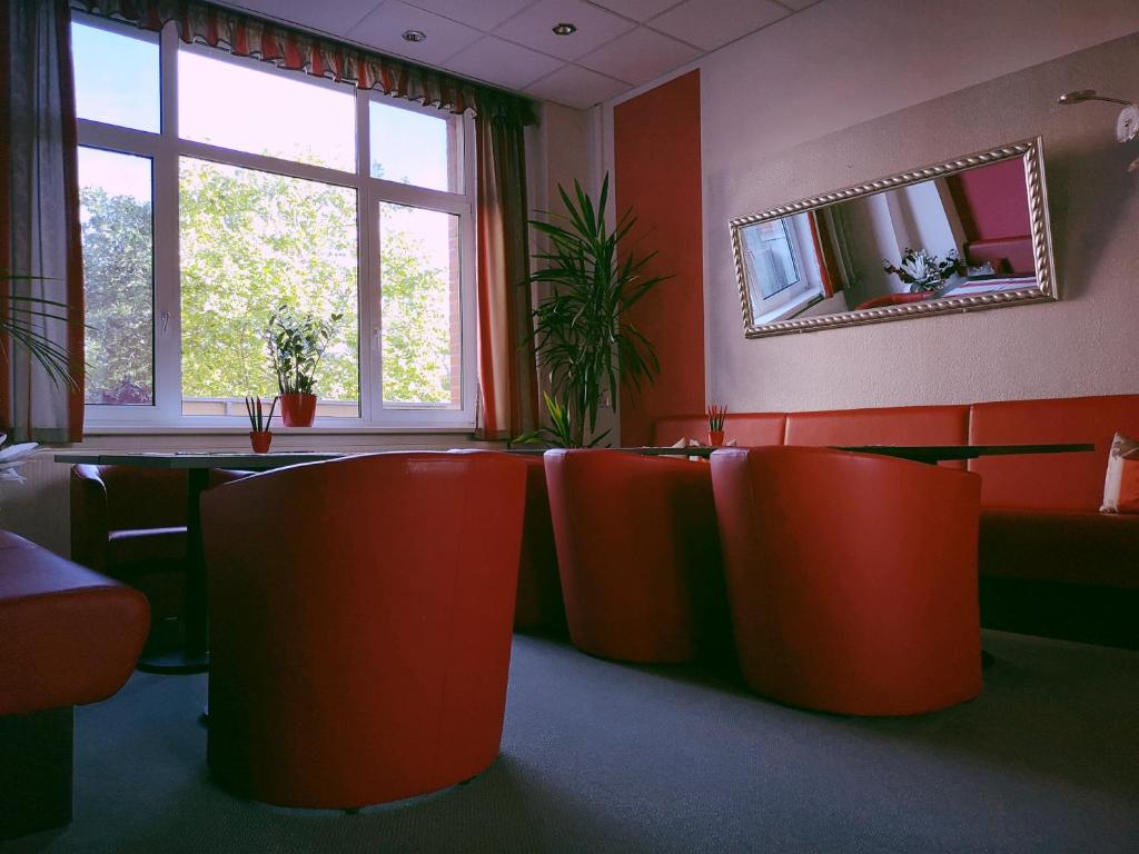 Televiisor ja/või meelelahutuskeskus majutusasutuses Hotel Zur Alten Druckerei