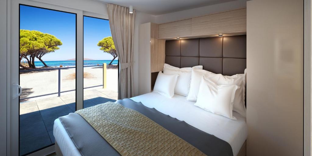 Posteľ alebo postele v izbe v ubytovaní Victoria Mobilehome in Istra Premium Camping Resort