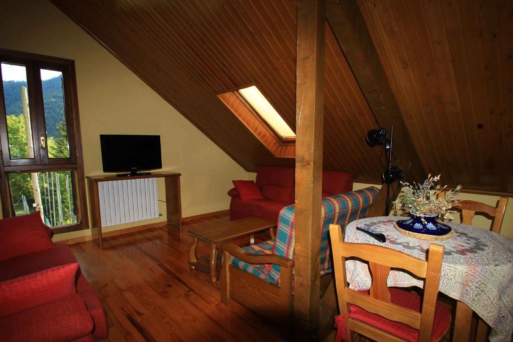 TV a/nebo společenská místnost v ubytování Hotel, Bungalows y Camping Viu