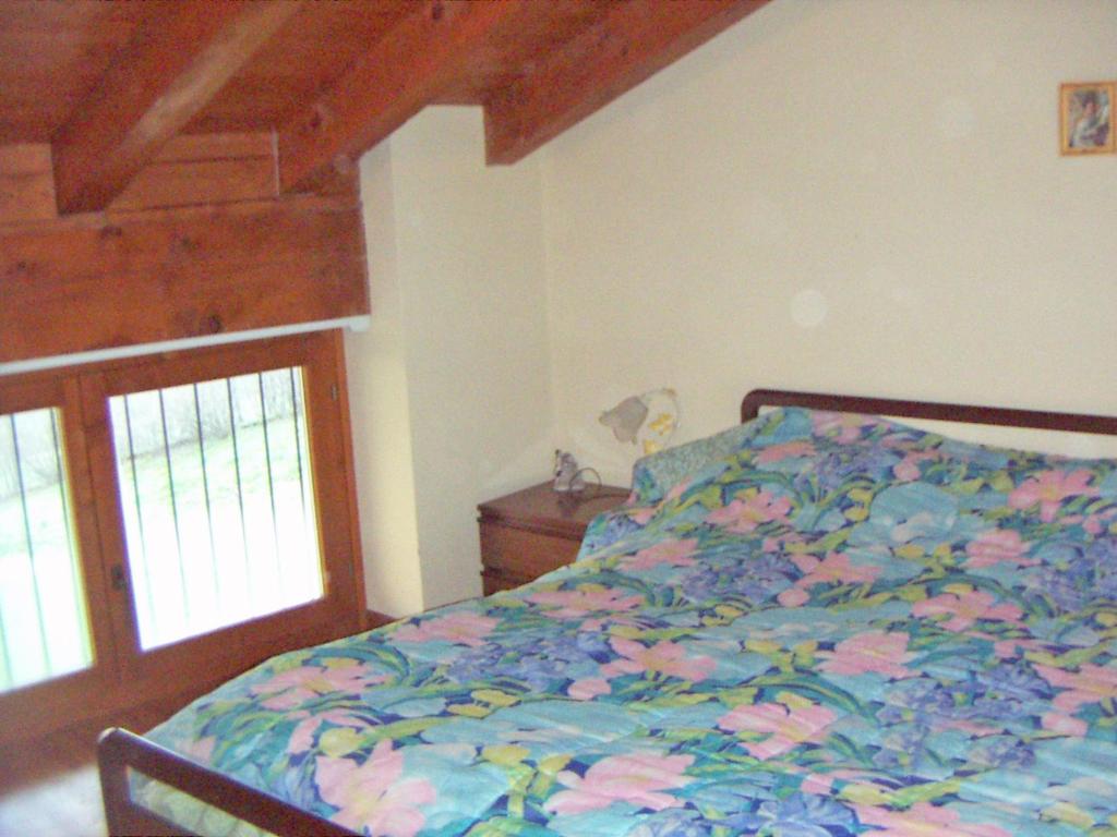 Postel nebo postele na pokoji v ubytování Casa di Bagattini