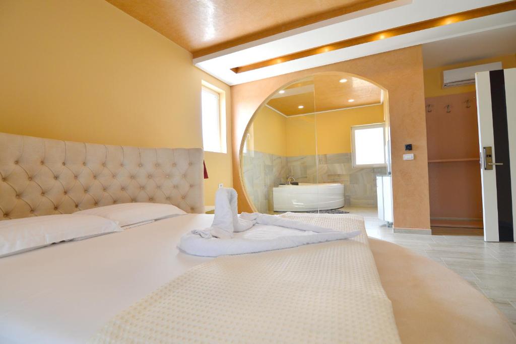 Postel nebo postele na pokoji v ubytování Monte Mare Hotel