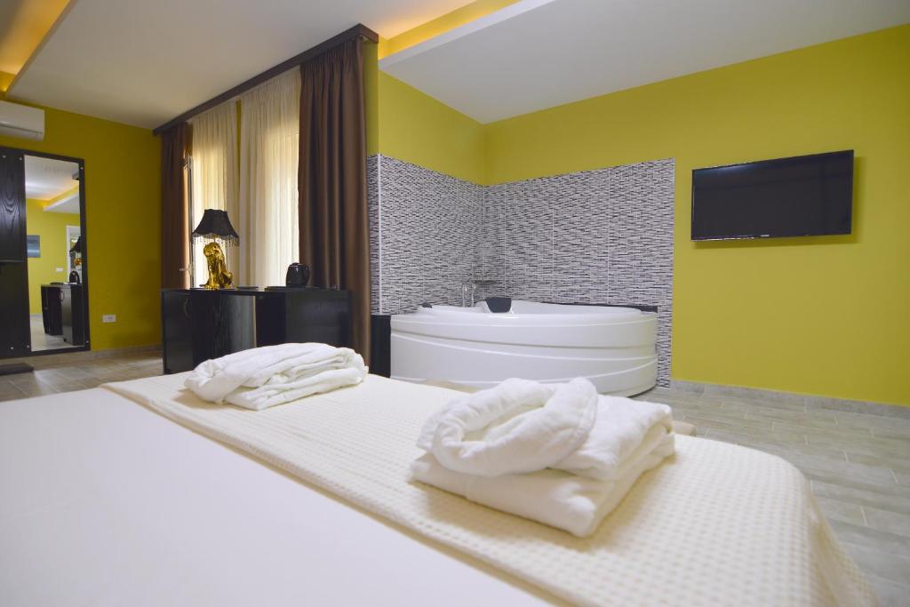 Postel nebo postele na pokoji v ubytování Monte Mare Hotel
