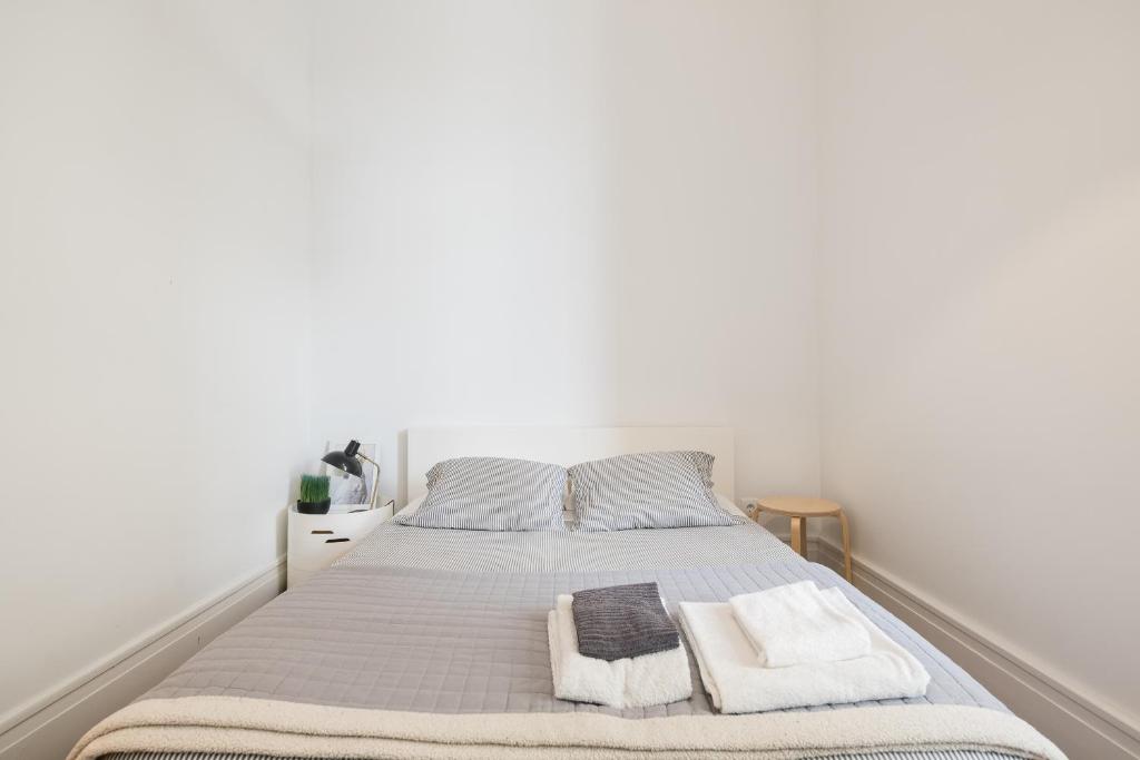 Postel nebo postele na pokoji v ubytování Baixa24 · City Center Private Sun Deck Apartment