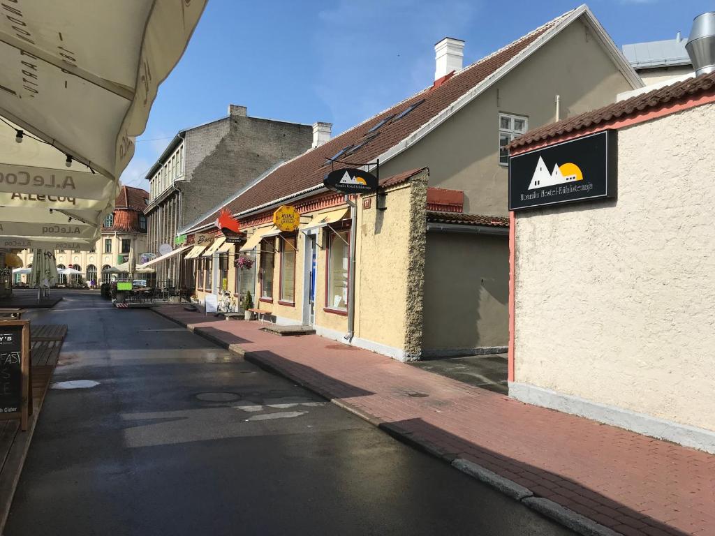 an empty street in a town with buildings at Hommiku Guesthouse in Pärnu