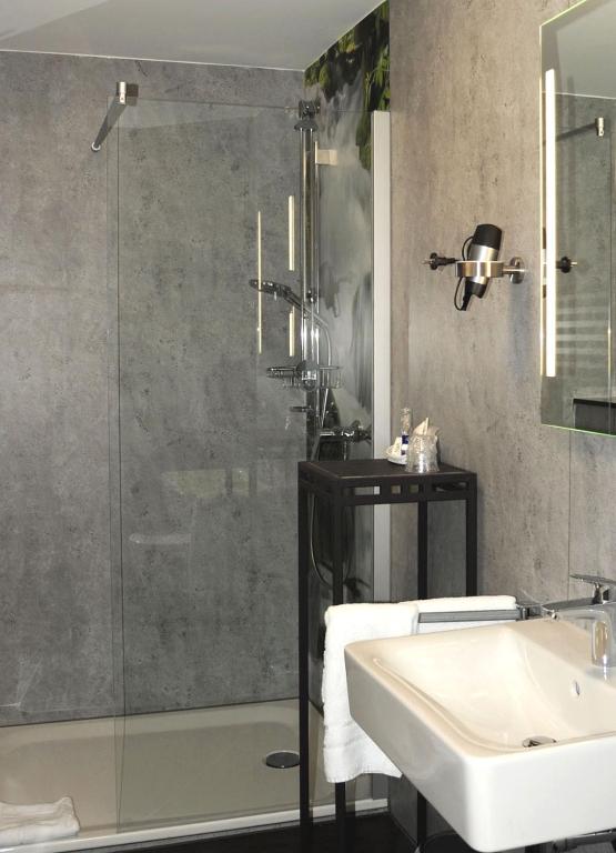Koupelna v ubytování Hotel Hamann