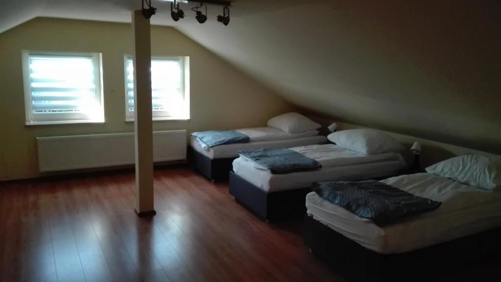 Posteľ alebo postele v izbe v ubytovaní Apartament 150m2 SZCZYTNO Mazury City CENTER Lake View