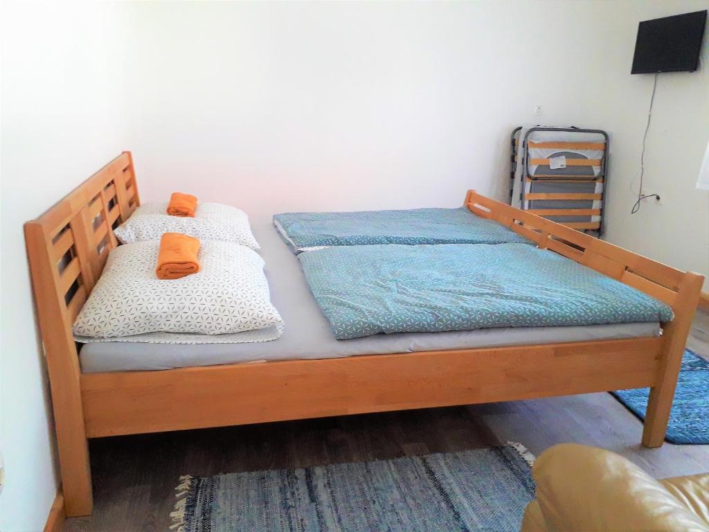 Postel nebo postele na pokoji v ubytování Kristály Vendégház